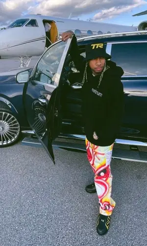 Tyga wearing Astrum hoody