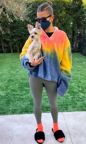 Hailey Bieber wearing Cactus Plant Flea Market sweatshirt