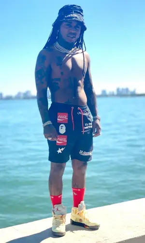 Jacquees wearing Chrome Hearts top