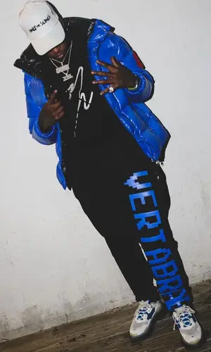 Lil Duke wearing Vertabrae pants