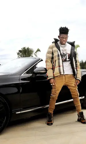 Yung Bleu wearing Burberry jacket
