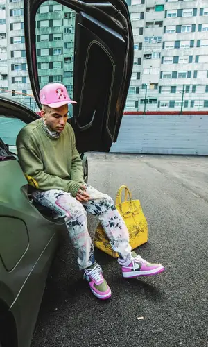 Sfera Ebbasta wearing Kapital sweater