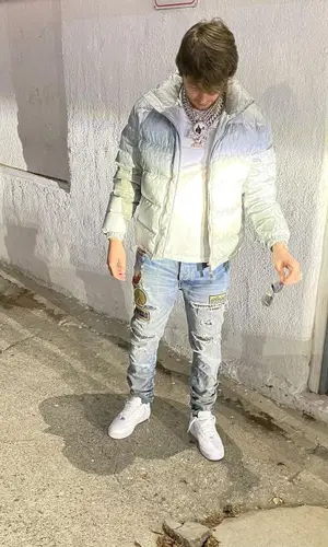 Murda Beatz wearing Dior jacket