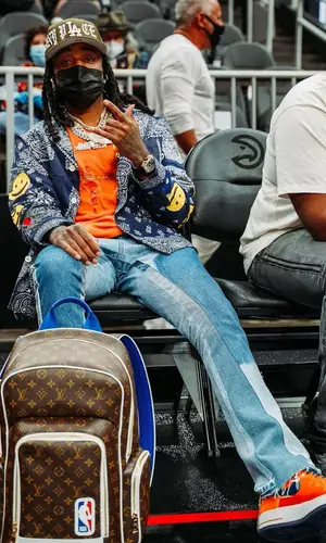 Quavo wearing Menace cap
