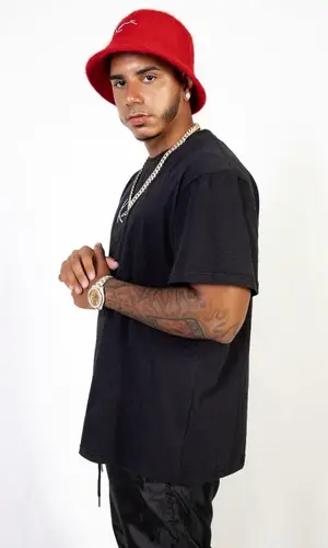 CJ wearing Karl Kani hat