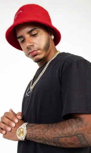 CJ wearing Karl Kani t-shirt