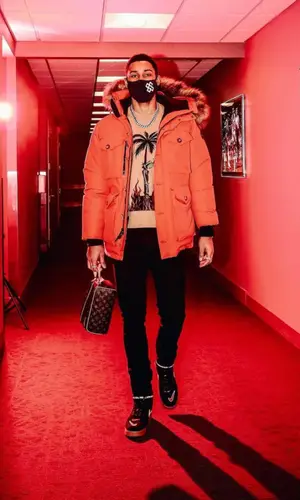 Ben Simmons wearing Saint Laurent jeans