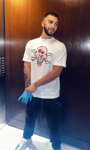 Manuel Turizo wearing Palm Angels t-shirt