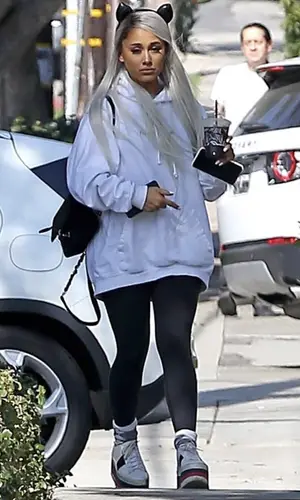 Ariana Grande wearing Gucci sneakers