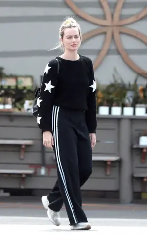 Margot Robbie wearing Adidas sneakers