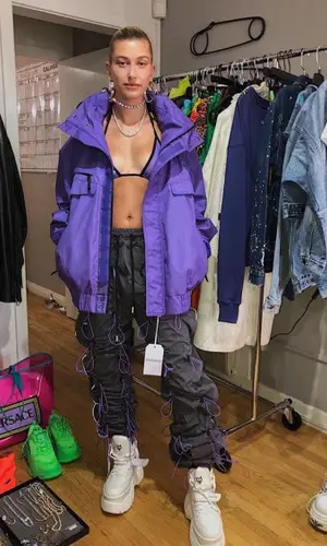 Hailey Bieber wearing 99%IS trousers