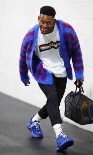 JuJu wearing Louis Vuitton bag