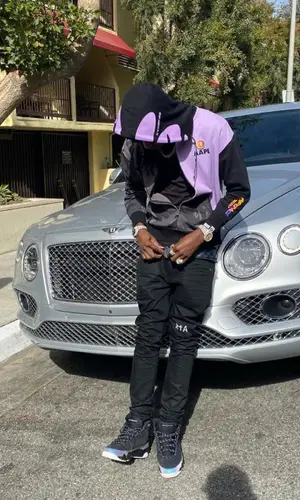 Lil Tjay wearing Jordan other