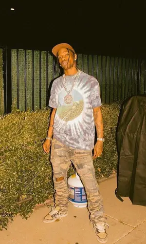 Travis Scott wearing Travis Scott Merch hat