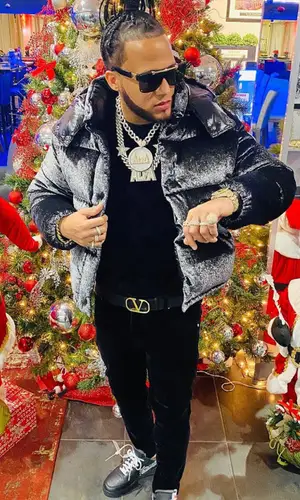El Alfa El Jefe wearing Dolce & Gabbana sweatshirt