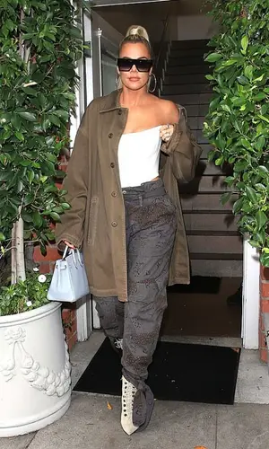 Khloe Kardashian wearing The Attico trousers