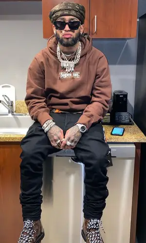 Bryant Mayers wearing Supreme sweatshirt
