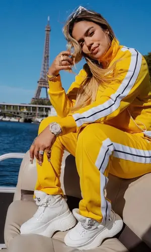 Karol G wearing Palm Angels jacket
