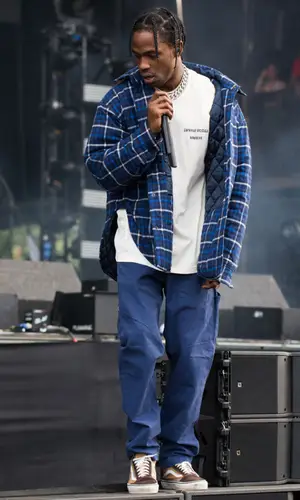 Travis Scott wearing Balenciaga shirt