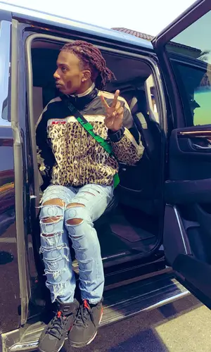 Playboi Carti wearing Off-White bag