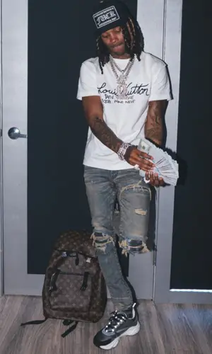 King Von wearing Dior sneakers