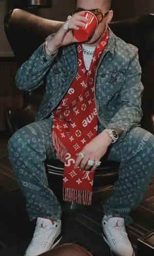 Bad Bunny wearing Supreme scarf