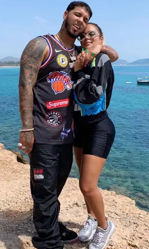 Anuel AA wearing Supreme jersey