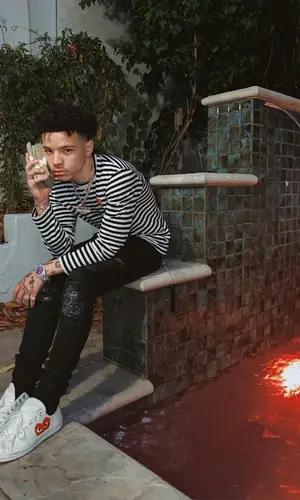 Lil Mosey wearing Amiri jeans