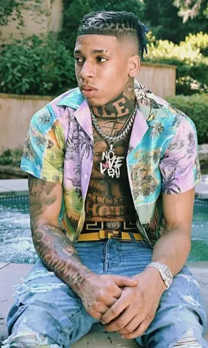 NLE Choppa wearing Amiri shirt