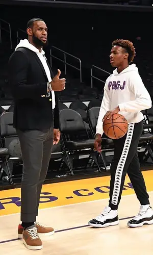 Bronny James wearing Kappa pants