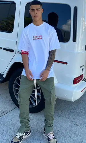 Lunay wearing Supreme t-shirt