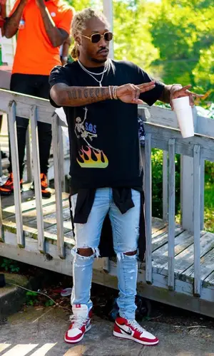 Future wearing Cease±Desist t-shirt