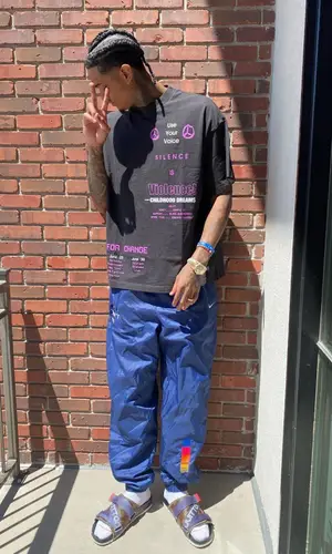 Jordan Clarkson wearing Childhood Dreams t-shirt