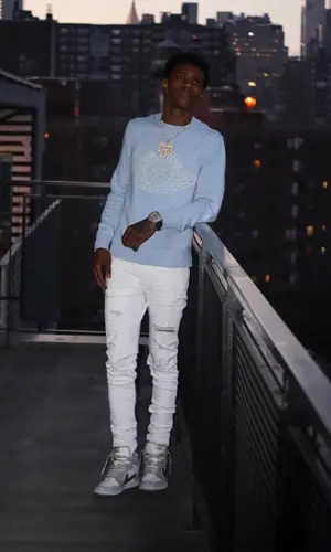 A Boogie Wit Da Hoodie wearing Dior sweater