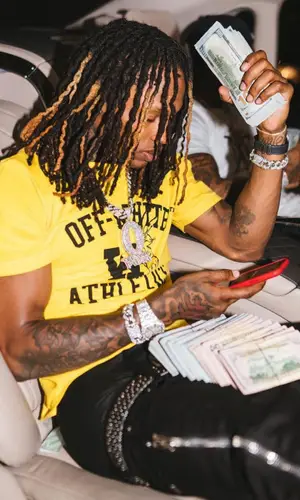 King Von wearing Dior sneakers