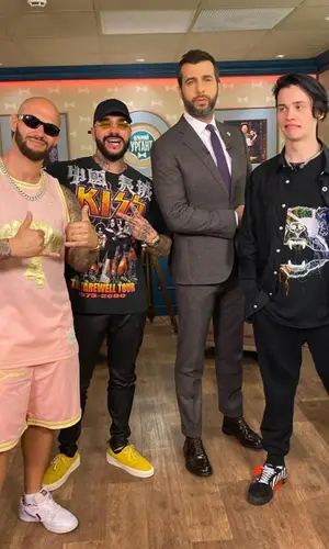 Даня Милохин wearing Marcelo Burlon pants