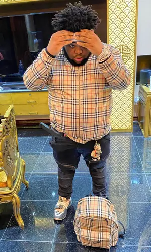 Rod Wave wearing Burberry jacket