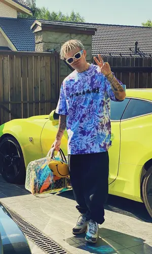 Элджей wearing Travis Scott Merch pants
