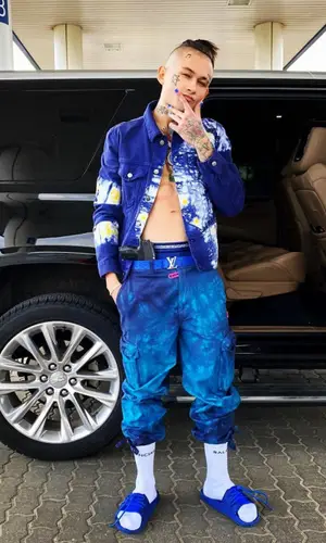 Morgenshtern wearing Palm Angels jacket