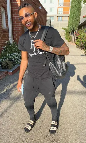 DDG wearing Louis Vuitton backpack