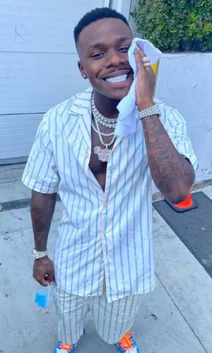 DaBaby wearing Gucci shirt