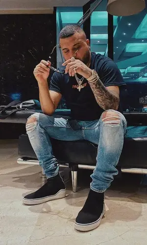 Dimelo Flow wearing Amiri jeans
