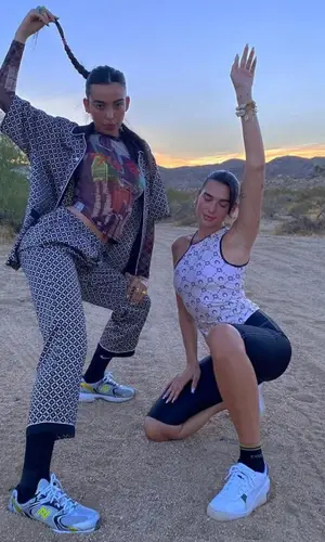 Dua Lipa wearing Gucci sock