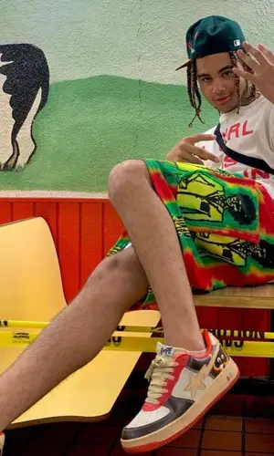 24kGoldn wearing Bape sneakers