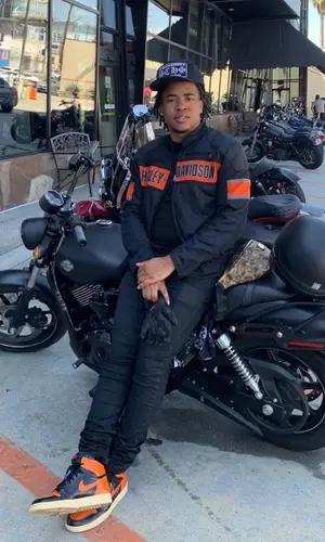 Turbo wearing Harley-Davidson jacket