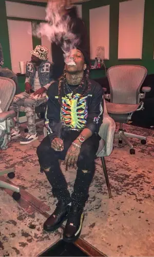 Chris King wearing Descending top