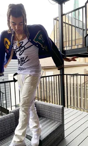 24kGoldn wearing Whensmokeclears jeans