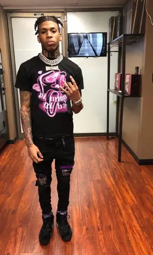 NLE Choppa wearing Jordan other