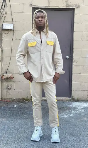 Lil Keed wearing Calvin Klein shirt