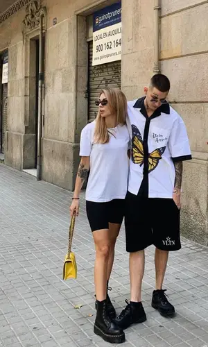 Kizaru wearing Palm Angels shirt